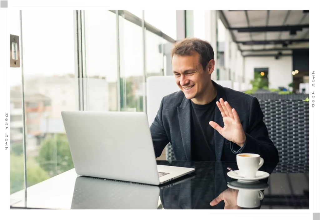 A friendly advisor wearing a headset smiles during a video call, holding a coffee cup in a relaxed, approachable manner — conveying a warm, no-pressure conversation with a knowledgeable guide.